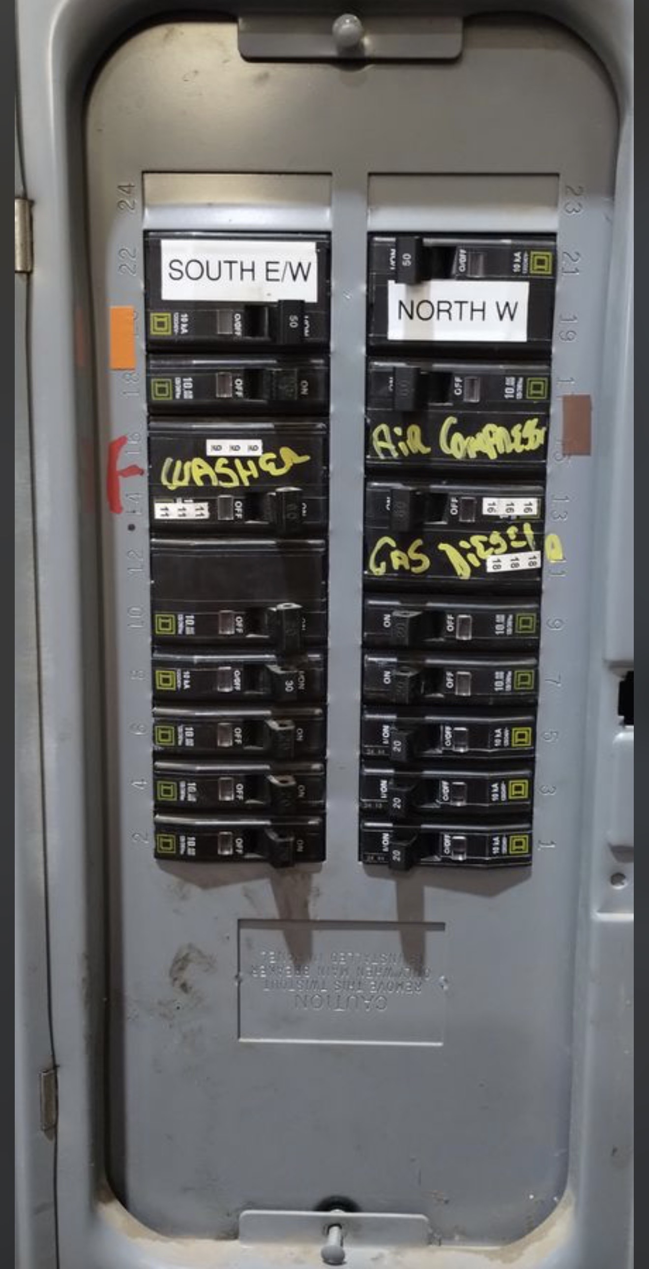 Service panel with hand-labeled circuits.